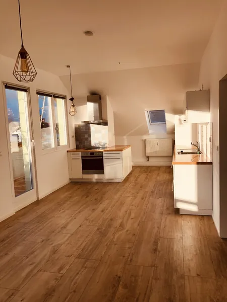 Helle Dachgeschosswohnung im Mehrfamilienhaus — photo 1